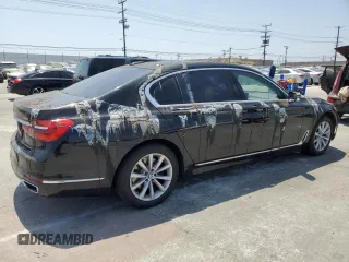 2018 BMW 7 Series 740i xDrive with VIN WBA7E4C57JGV23763, listed as a Copart auction lot 67151864 with 173,803 mi miles and Clean Title. Bid and sale history available at carsss.com. Image 3.