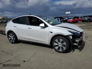 2023 Tesla Model Y Long Range with VIN 7SAYGDEE3PF693316, listed as a Copart auction lot 49501945 with 0 mi miles and Salvage Title. Bid and sale history available at carsss.com. Image 4.
