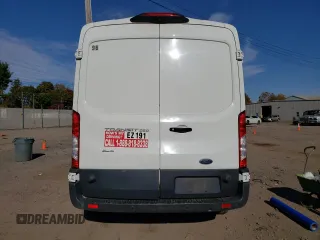 2018 Ford Transit z VIN 1FTYR2CMXJKA73854, wystawiony jako Copart lot #81051414 z przebiegiem Nie podano mil oraz Szkody całkowita. Historia ofert i sprzedaży dostępna na DreamBid. Obrazek 6.