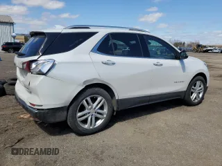 2021 Chevrolet Equinox Premier z VIN 2GNAXXEV6M6137669, wystawiony jako Copart lot #53437745 z przebiegiem 93 812 mil mil oraz Szkoda całkowita • Salvage title. Historia ofert i sprzedaży dostępna na DreamBid. Obrazek 3.