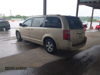 2010 Dodge Grand Caravan SXT with VIN 2D4RN5D17AR496854, listed as a IAAI auction lot 42210738 with 213,121 mi miles and . Bid and sale history available at DreamBid. Image 3.