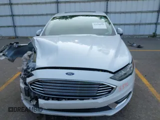 2018 Ford Fusion SE with VIN 3FA6P0HD7JR230705, listed as a IAAI auction lot 42518890 with 114,988 mi miles and . Bid and sale history available at DreamBid. Image 13.