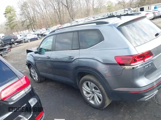 2021 Volkswagen Atlas SE z VIN 1V2WR2CA0MC585259, wystawiony jako IAAI lot #41525783 z przebiegiem 80 101 mil mil oraz . Historia ofert i sprzedaży dostępna na DreamBid. Obrazek 14.