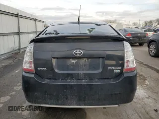 2005 Toyota Prius z VIN JTDKB20U653052272, wystawiony jako Copart lot #52339475 z przebiegiem 299 999 mil mil oraz Nie do naprawy • Non repairable. Historia ofert i sprzedaży dostępna na DreamBid. Obrazek 6.