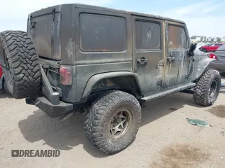 2016 Jeep Wrangler Unlimited Sahara z VIN 1C4HJWEG4GL261147, wystawiony jako IAAI lot #42239252 z przebiegiem 69 604 mil mil oraz . Historia ofert i sprzedaży dostępna na DreamBid. Obrazek 4.