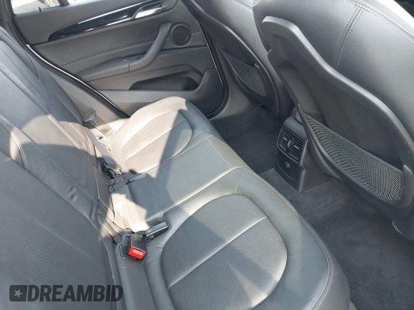 2018 BMW X1 xDrive28i with VIN WBXHT3C32J5K23486, listed as a IAAI auction lot 42387208 with 76,115 mi miles and . Bid and sale history available at DreamBid. Image 8.