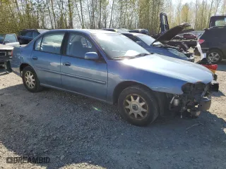 1999 Chevrolet Malibu LS with VIN 1G1NE52JXX6159537, listed as a Copart auction lot 50985934 with 157,620 mi miles and Salvage Title. Bid and sale history available at carsss.com. Image 4.