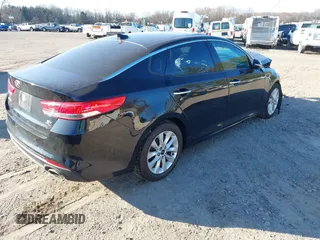 2018 Kia Optima EX with VIN 5XXGU4L31JG209828, listed as a IAAI auction lot 41762547 with 169,408 mi miles and . Bid and sale history available at carsss.com. Image 4.