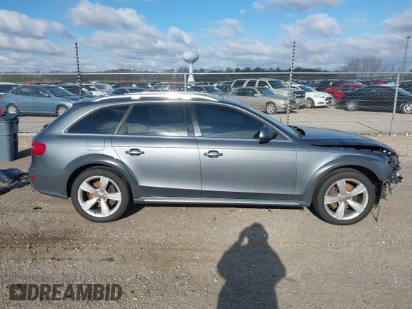 2014 Audi allroad A4 Premium Plus z VIN WA1UFAFL8EA133365, wystawiony jako IAAI lot #42034903 z przebiegiem 145 285 mil mil oraz . Historia ofert i sprzedaży dostępna na DreamBid. Obrazek 14.