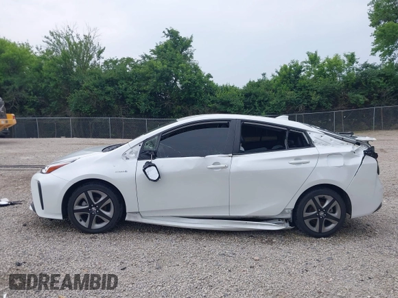 2021 Toyota Prius L Eco with VIN JTDKAMFU6M3137679, listed as a IAAI auction lot 42488129 with 52,414 mi miles and . Bid and sale history available at DreamBid. Image 15.