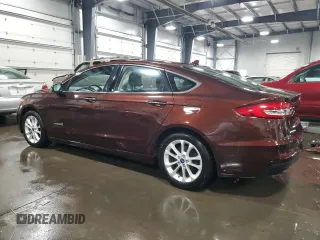 2019 Ford Fusion Hybrid SEL with VIN 3FA6P0MU5KR149757, listed as a Copart auction lot 67573034 with 64,695 mi miles and Salvage Title. Bid and sale history available at carsss.com. Image 2.