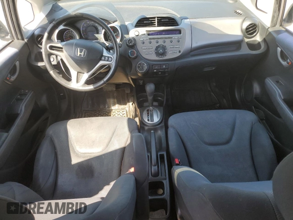 2009 Honda Fit Sport z VIN JHMGE88489S010278, wystawiony jako Copart lot #52251405 z przebiegiem 120 511 mil mil oraz Szkoda całkowita • Salvage title. Historia ofert i sprzedaży dostępna na DreamBid. Obrazek 8.