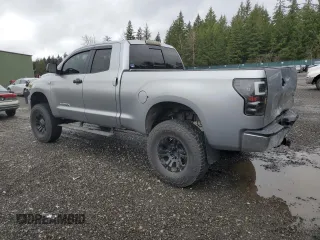 2010 Toyota Tundra 4WD Truck with VIN 5TFUM5F15AX005299, listed as a Copart auction lot 45156505 with 137,452 mi miles and Salvage Title. Bid and sale history available at carsss.com. Image 2.