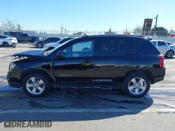 2016 Jeep Compass Latitude with VIN 1C4NJCEB2GD628384, listed as a IAAI auction lot 41752694 with 122,589 mi miles. Bid and sale history available at carsss.com. Image 14.