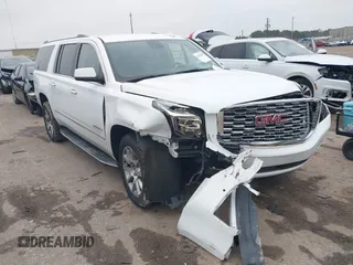 2020 GMC Yukon XL Denali with VIN 1GKS1HKJ2LR170035, listed as a IAAI auction lot 41447285 with 87,118 mi miles. Bid and sale history available at carsss.com. Image 1.