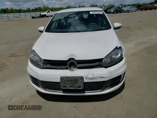 2011 Volkswagen GTI PZEV z VIN WVWHD7AJ2BW174241, wystawiony jako Copart lot #56940305 z przebiegiem 112 705 mil mil oraz Szkoda całkowita • Salvage title. Historia ofert i sprzedaży dostępna na DreamBid. Obrazek 13.