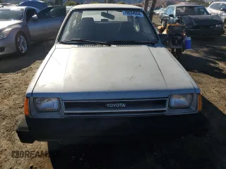 1986 Toyota Tercel z VIN JT2AL31G5G0429131, wystawiony jako Copart lot #79204554 z przebiegiem 124 477 mil mil oraz Szkoda całkowita • Salvage title. Historia ofert i sprzedaży dostępna na DreamBid. Obrazek 5.
