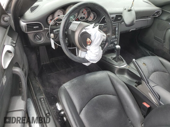 2009 Porsche 911 Carrera S with VIN WP0CB29919S755552, listed as a Copart auction lot 59403325 with 57,990 mi miles and Salvage title. Bid and sale history available at DreamBid. Image 8.