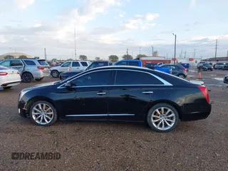 2017 Cadillac XTS Luxury with VIN 2G61M5S3XH9116856, listed as a IAAI auction lot 41893527 with 135,762 mi miles. Bid and sale history available at carsss.com. Image 14.