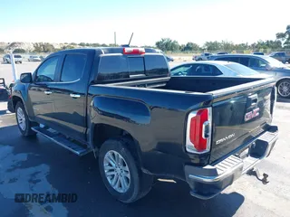 2016 GMC Canyon 2WD SLT with VIN 1GTG5DE35G1184141, listed as a IAAI auction lot 40875490 with 126,747 mi miles. Bid and sale history available at carsss.com. Image 3.