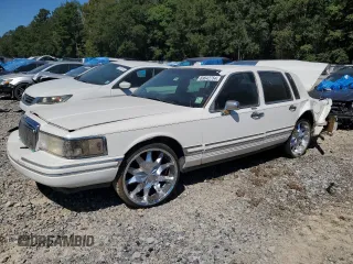 1994 Lincoln Town Car Signature z VIN 1LNLM82W7RY781174, wystawiony jako Copart lot #69642754 z przebiegiem 149 185 mil mil oraz Szkody całkowita. Historia ofert i sprzedaży dostępna na DreamBid. Obrazek 1.