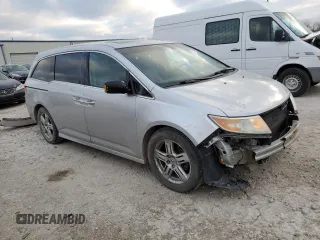 2012 Honda Odyssey Touring with VIN 5FNRL5H93CB114322, listed as a Copart auction lot 50516135 with 300,071 mi miles and Salvage Title. Bid and sale history available at carsss.com. Image 4.