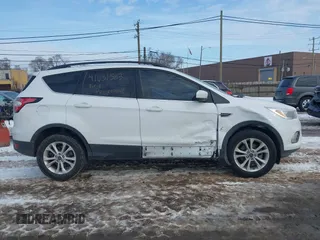 2018 Ford Escape SE with VIN 1FMCU0GD1JUC48757, listed as a IAAI auction lot 41631583 with 80,700 mi miles. Bid and sale history available at carsss.com. Image 13.