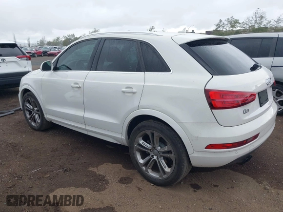 2016 Audi Q3 Premium Plus with VIN WA1BFCFS0GR009654, listed as a IAAI auction lot 42141372 with 138,992 mi miles. Bid and sale history available at carsss.com. Image 3.