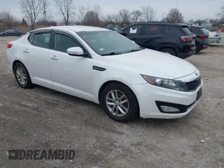 2013 Kia Optima LX with VIN KNAGM4A76D5379047, listed as a IAAI auction lot 41973373 with 135,454 mi miles. Bid and sale history available at carsss.com. Image 1.