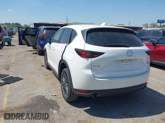 2019 Mazda CX-5 Touring with VIN JM3KFACM7K1656311, listed as a IAAI auction lot 41833187 with 83,888 mi miles. Bid and sale history available at carsss.com. Image 3.