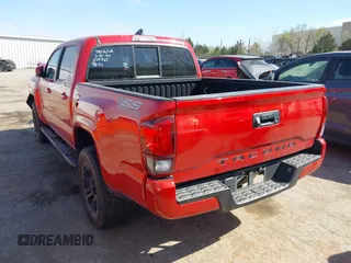 2022 Toyota Tacoma SR with VIN 3TYAX5GNXNT042988, listed as a IAAI auction lot 41879152 with 30,383 mi miles and . Bid and sale history available at DreamBid. Image 3.