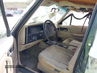 1996 Jeep Cherokee Sport with VIN 1J4FJ68S2TL154142, listed as a IAAI auction lot 42116515 with 197,095 mi miles and . Bid and sale history available at DreamBid. Image 5.