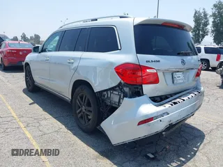 2014 Mercedes-Benz GL 450 z VIN 4JGDF7CE9EA411572, wystawiony jako IAAI lot #42461631 z przebiegiem 121 885 mil mil oraz . Historia ofert i sprzedaży dostępna na DreamBid. Obrazek 6.