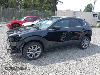 2023 Mazda CX-30 S Carbon Edition with VIN 3MVDMBCM3PM562447, listed as a IAAI auction lot 42174280 with 22,028 mi miles and . Bid and sale history available at DreamBid. Image 15.