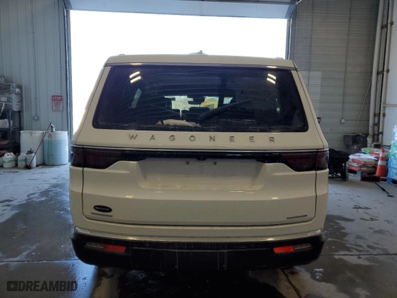 2022 Jeep Wagoneer Series III with VIN 1C4SJVDT5NS143609, listed as a Copart auction lot 44544665 with 34,470 mi miles and Salvage Title. Bid and sale history available at carsss.com. Image 6.