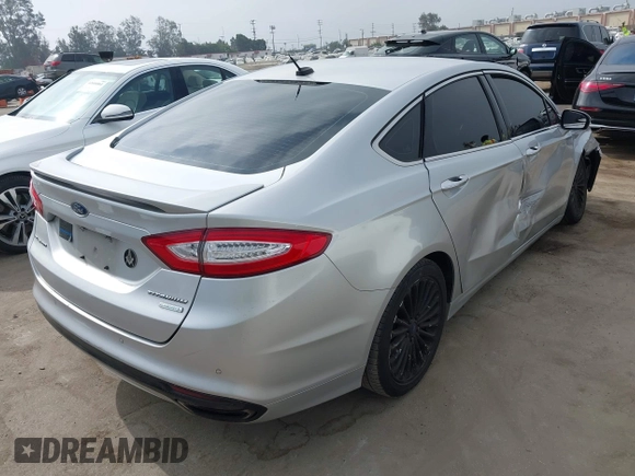 2016 Ford Fusion Titanium z VIN 3FA6P0K92GR135076, wystawiony jako IAAI lot #42604875 z przebiegiem 192 785 mil mil oraz . Historia ofert i sprzedaży dostępna na DreamBid. Obrazek 4.