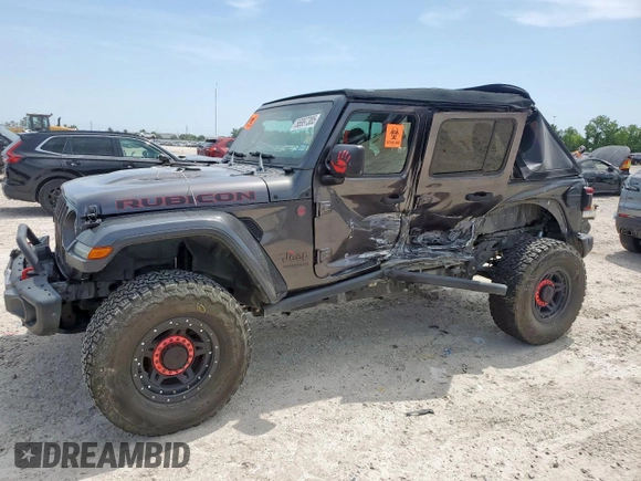 2018 Jeep Wrangler Unlimited Rubicon with VIN 1C4HJXFG6JW166731, listed as a Copart auction lot 56997385 with 117,713 mi miles and Salvage title. Bid and sale history available at DreamBid. Image 1.