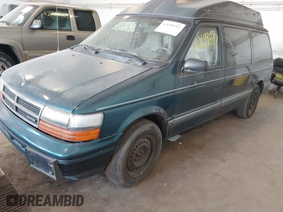 1995 Dodge Caravan Grand SE with VIN 1B4GH44R3SX566801, listed as a IAAI auction lot 42699597 with 103,069 mi miles and . Bid and sale history available at DreamBid. Image 2.