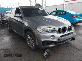 2016 BMW X6 xDrive50i with VIN 5UXKU6C59G0S82526, listed as a IAAI auction lot 41786622 with 110,796 mi miles. Bid and sale history available at carsss.com. Image 1.