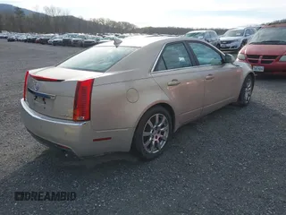 2009 Cadillac CTS AWD w/1SB with VIN 1G6DT57V090154165, listed as a IAAI auction lot 41907798 with 167,874 mi miles. Bid and sale history available at carsss.com. Image 4.