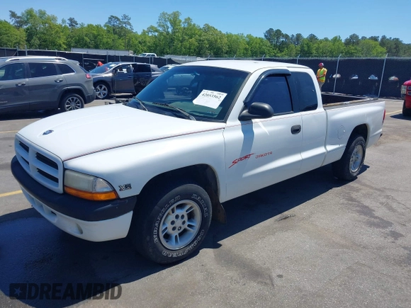 1999 Dodge Dakota SLT z VIN 1B7GL22X0XS193423, wystawiony jako IAAI lot #42053562 z przebiegiem 209 802 mil mil oraz . Historia ofert i sprzedaży dostępna na DreamBid. Obrazek 2.
