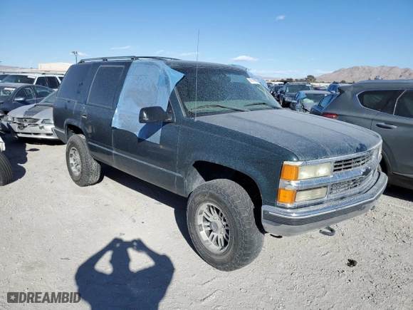 1997 Chevrolet Tahoe with VIN 1GNEK13R8VJ345656, listed as a Copart auction lot 48141495 with 250,273 mi miles and Salvage Title. Bid and sale history available at carsss.com. Image 4.