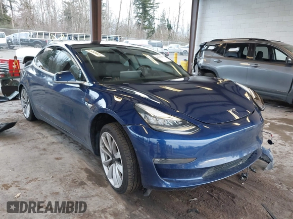 2018 Tesla Model 3 Long Range Battery z VIN 5YJ3E1EA7JF035949, wystawiony jako IAAI lot #41627027 z przebiegiem Nie podano mil oraz . Historia ofert i sprzedaży dostępna na DreamBid. Obrazek 1.