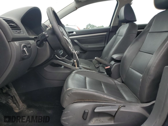 2009 Volkswagen Jetta SE with VIN 3VWRZ71K59M055735, listed as a Copart auction lot 60202485 with 160,196 mi miles and Salvage title. Bid and sale history available at DreamBid. Image 7.
