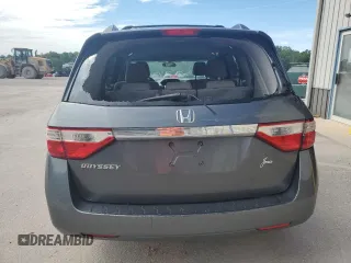 2012 Honda Odyssey LX с VIN 5FNRL5H21CB009359, выставлен на аукционе Copart как лот 57669225 с пробегом 162 757 миль миль и Списание • Salvage title. История ставок и продаж доступна на DreamBid. Изображение 6.