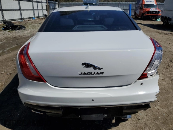 2016 Jaguar XJ Portfolio with VIN SAJWA2G70G8W01136, listed as a Copart auction lot 50120455 with 92,224 mi miles and Salvage title. Bid and sale history available at DreamBid. Image 6.
