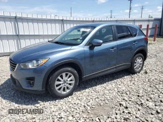 2016 Mazda CX-5 Touring z VIN JM3KE4CY8G0692206, wystawiony jako Copart lot #61340885 z przebiegiem 154 470 mil mil oraz Czysty tytuł • Clean title. Historia ofert i sprzedaży dostępna na DreamBid. Obrazek 1.