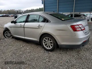2014 Ford Taurus SE with VIN 1FAHP2D87EG164232, listed as a Copart auction lot 83407024 with 156,348 mi miles and Salvage Title. Bid and sale history available at DreamBid. Image 2.