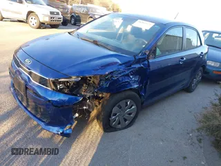 2020 Kia Rio S with VIN 3KPA25ADXLE260785, listed as a IAAI auction lot 41261822 with 28,433 mi miles and . Bid and sale history available at DreamBid. Image 17.