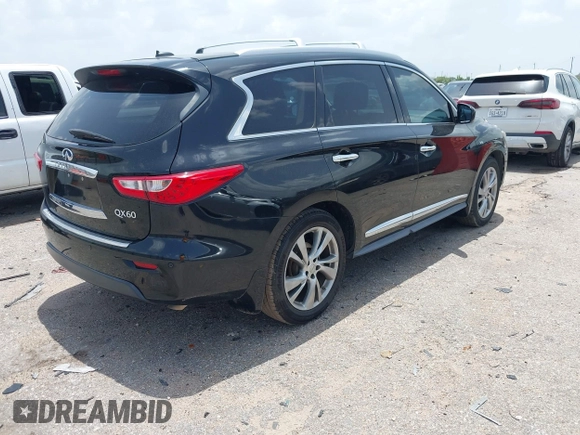 2014 Infiniti QX60 with VIN 5N1AL0MN9EC515324, listed as a IAAI auction lot 42637133 with 123,452 mi miles and . Bid and sale history available at DreamBid. Image 4.